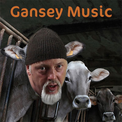 man in a stall with a row of cows