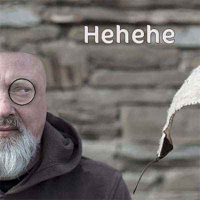 a man's face with no top to his head and his hat to one side